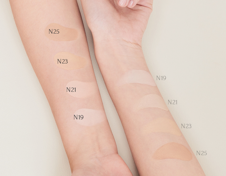 Tonalità N19, N21, N23 e N25 di MUZIGAE MANSION Sleek Matt Cushion a confronto su due avambracci